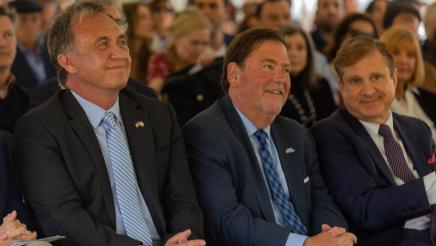 Asm. Zbur and audience members seated, listening on