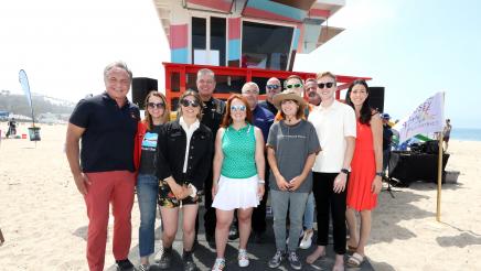Asm. Zbur, Los Angeles County Sup. Lindsey P. Horvath and others gather to commemorate the painting of lifeguard towers 17 & 18 at Ginger Rogers Beach near Santa Monica