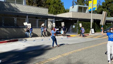 UC-AFT, a union representing lecturers, program coordinators, supervisors of teacher education, and librarians at UCLA, striking over unfair labor practices