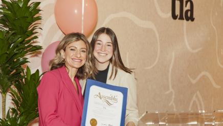 Tia Co-Founder and CEO holding an Assembly Certificate of Recognition with Asm. Zbur Field Representative Hannah Wenger
