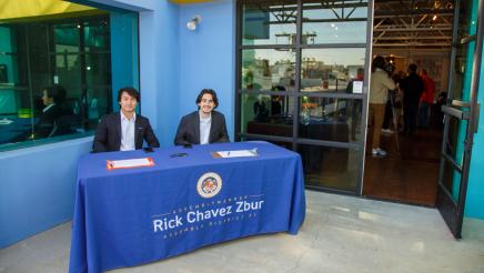 Staffers at table, ready to greet constituents