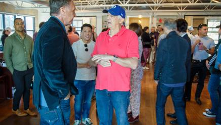 Asm. Zbur in conversation with constituent as other constituents mingle in background
