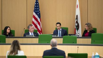 Speaker Rivas addressing hearing witnesses while Asm. Zbur listens on