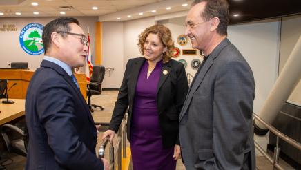 Asm. Zbur and Asm. Schiavo speaking with guest