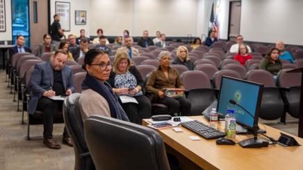 Panelist and audience listening on