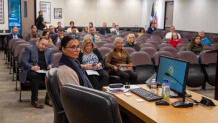 Panelist and audience listening on