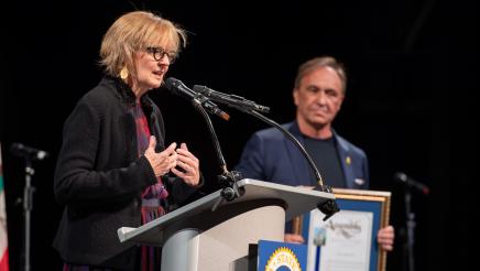 Kerry Morrison receives the AD51 Community Excellence Award for Homelessness Advocacy.