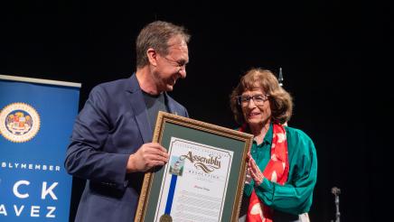 Marian Dodge accepts the AD51 Community Excellence Award for Environmental Protection.