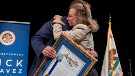 Dena Bloom receives the AD51 Community Excellence Award for Combating Antisemitism.