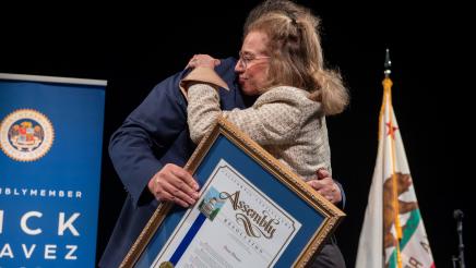 Dena Bloom receives the AD51 Community Excellence Award for Combating Antisemitism.