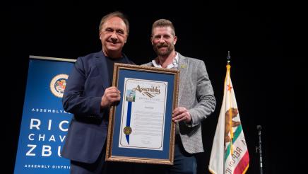 Jonah Platt receives the AD51 Community Excellence Award for Combating Antisemitism.