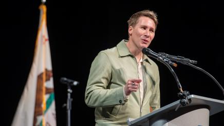 Dustin Lance Black receives the AD51 Community Excellence Award for LGBTQ+ Inclusion and Visibility.