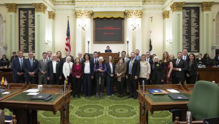 Group photo of Asm. Zbur, Mr. Friedman, Speaker Rivas and other members and guests
