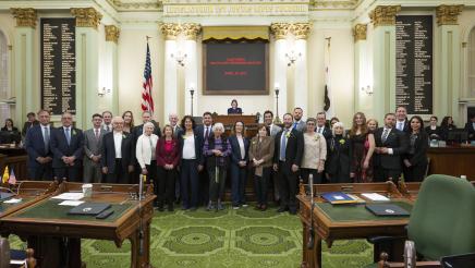 Group photo of Asm. Zbur, Mr. Friedman, Speaker Rivas and other members and guests