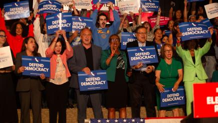 Asm. Zbur, other legislators and supporters cheering, some holding signs