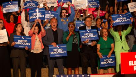 Asm. Zbur, other legislators and supporters cheering, some holding signs